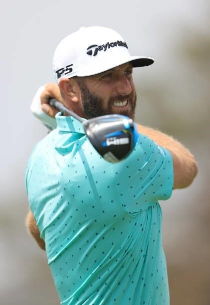 Dustin Johnson of the United States hits a tee shot during a practice round prior to the start of the 2021 U.S. Open at Torrey Pines Golf Course on...