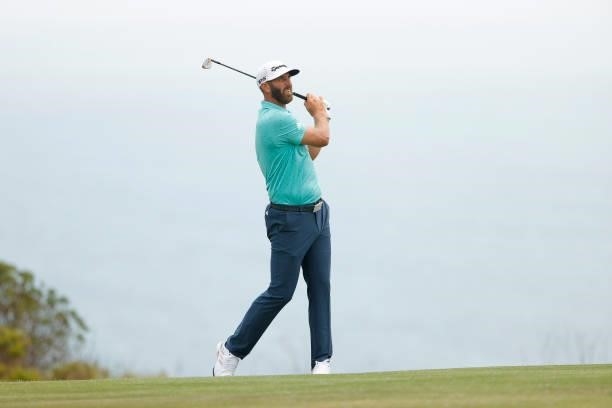 Dustin Johnson of the United States watches his shot during a practice round prior to the start of the 2021 U.S. Open at Torrey Pines Golf Course on...