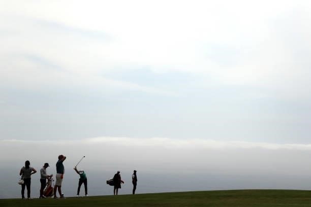 Dustin Johnson of the United States plays a shot during a practice round prior to the start of the 2021 U.S. Open at Torrey Pines Golf Course on June...