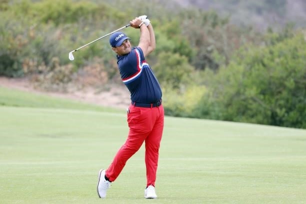 Patrick Reed of the United States plays a shot on the 13th hole during a practice round prior to the start of the 2021 U.S. Open at Torrey Pines Golf...