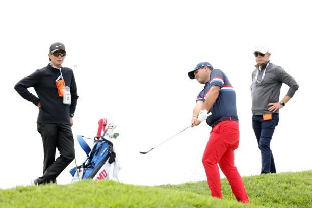 Patrick Reed of the United States plays a shot on the 12th hole during a practice round prior to the start of the 2021 U.S. Open at Torrey Pines Golf...