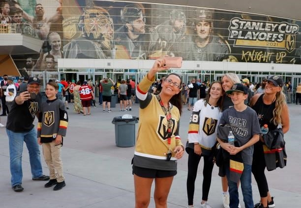 Vegas Golden Knights fans pose for selfies as they arrive at Game Two of the Stanley Cup Semifinals during the 2021 Stanley Cup Playoffs between the...