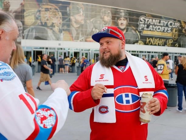 Montreal Canadiens fan Jean-Phillipe Dupuis of Florida greets other fans as they arrive at Game Two of the Stanley Cup Semifinals during the 2021...