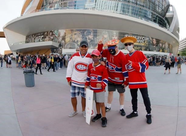 Montreal Canadiens fans Alan Blouin, Matisse Blouin, Kush Kapila and Shiv Kapila, all of California, pose as they arrive at Game Two of the Stanley...