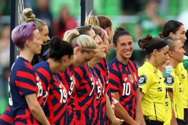 Carli Lloyd of United States smiles with teammates fans prior to the Summer Series game between United States and Nigeria at Q2 Stadium on June 16,...