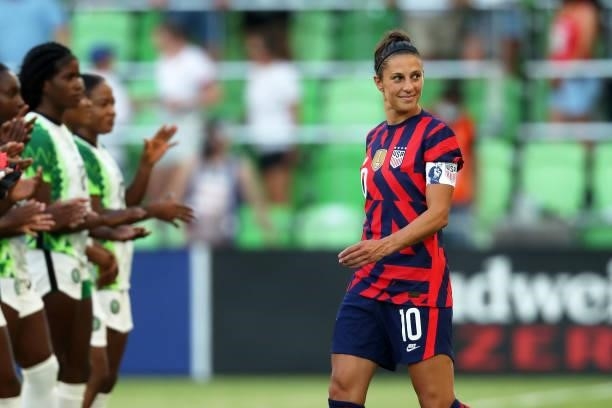 Carli Lloyd of United States greets fans prior to the Summer Series game between United States and Nigeria at Q2 Stadium on June 16, 2021 in Austin,...