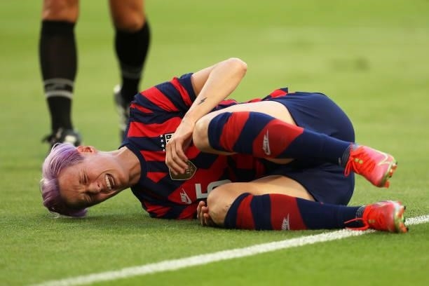Megan Rapinoe of United States reacts after suffering an injury during the Summer Series game between United States and Nigeria at Q2 Stadium on June...