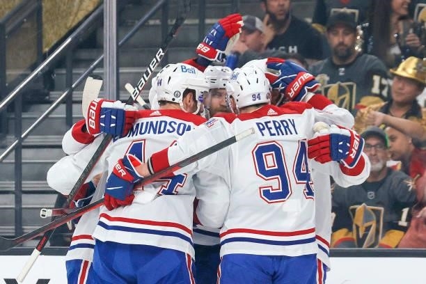 Joel Armia of the Montreal Canadiens is congratulated by his teammates after scoring a goal against the Vegas Golden Knights during the first period...