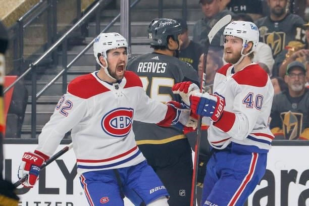 Joel Armia of the Montreal Canadiens is congratulated by Erik Gustafsson after scoring a goal against the Vegas Golden Knights during the first...