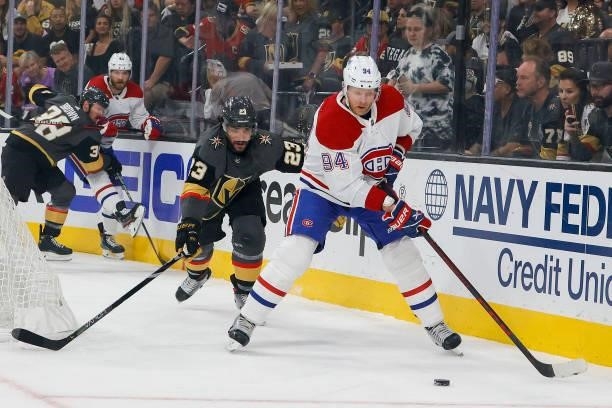 Corey Perry of the Montreal Canadiens is pursued by Alec Martinez of the Vegas Golden Knights during the first period in Game Two of the Stanley Cup...