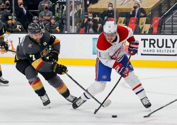Brendan Gallagher of the Montreal Canadiens is defended by Alex Pietrangelo of the Vegas Golden Knights during the first period in Game Two of the...