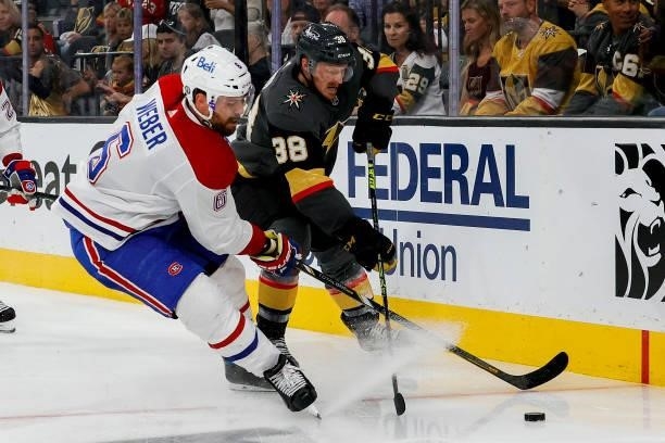 Patrick Brown of the Vegas Golden Knights battles for the puck with Shea Weber of the Montreal Canadiens during the second period in Game Two of the...