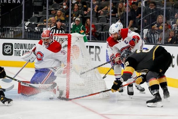 William Carrier of the Vegas Golden Knights attempts a wrap-around on Carey Price of the Montreal Canadiens as Shea Weber defends during the second...