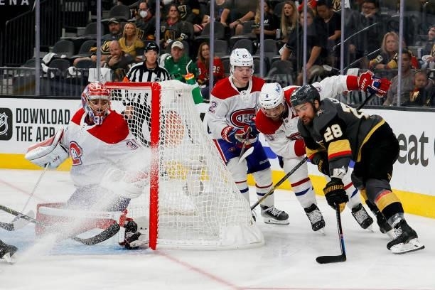 William Carrier of the Vegas Golden Knights attempts a wrap-around on Carey Price of the Montreal Canadiens as Shea Weber defends during the second...