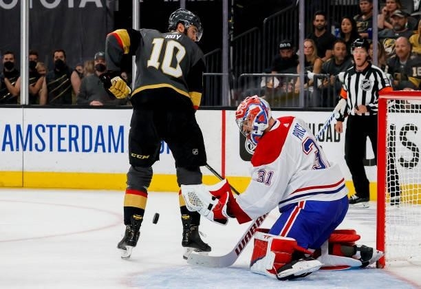 Carey Price of the Montreal Canadiens makes the save against Nicolas Roy of the Vegas Golden Knights during the second period in Game Two of the...