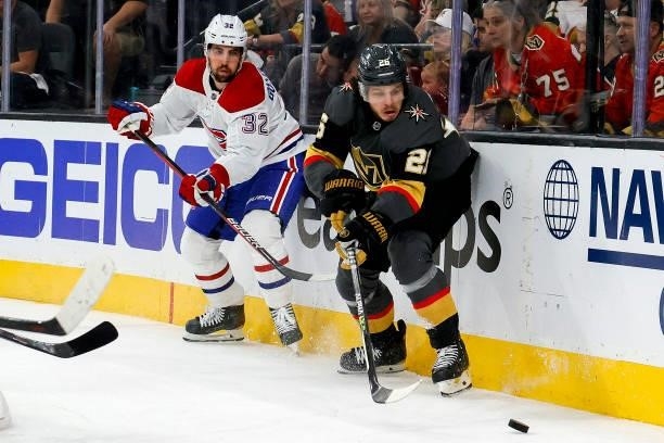Mattias Janmark of the Vegas Golden Knights is defended by Erik Gustafsson of the Montreal Canadiens during the second period in Game Two of the...
