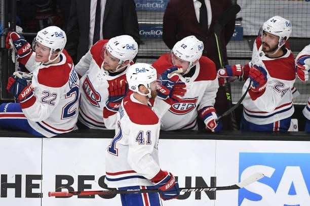 Paul Byron of the Montreal Canadiens is congratulated by his teammates at the bench after scoring a goal against the Vegas Golden Knights during the...
