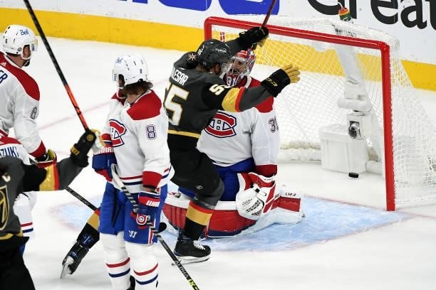 Keegan Kolesar of the Vegas Golden Knights celebrates a goal by teammate Alex Pietrangelo past Carey Price of the Montreal Canadiens during the...