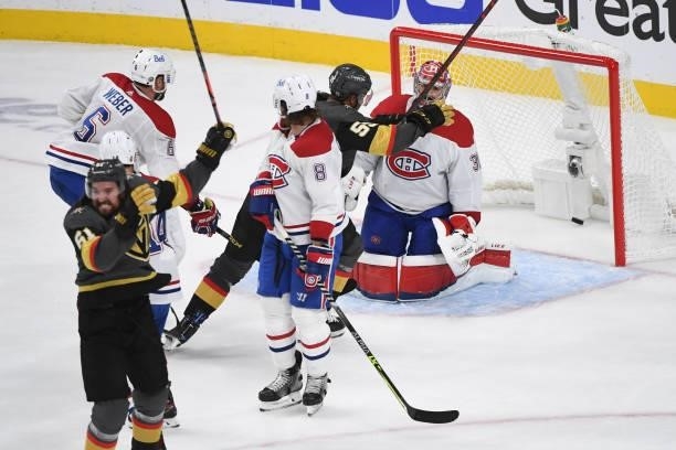 Mark Stone and Keegan Kolesar of the Vegas Golden Knights celebrate their goal against Carey Price of the Montreal Canadiens in the second period in...