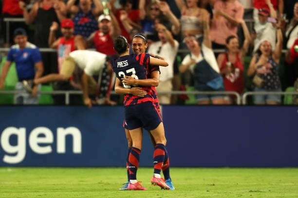 Lynn Williams of United States celebrates with teammate Christen Press after scoring the the second goal of her team during the Summer Series game...