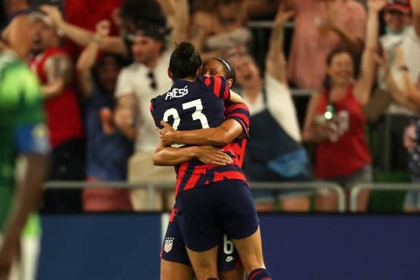 Lynn Williams of United States celebrates with teammate Christen Press after scoring the the second goal of her team during the Summer Series game...