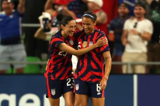 Lynn Williams of United States celebrates with teammate Christen Press after scores 2nd goal during the Summer Series game between United States and...