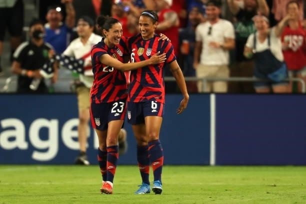 Lynn Williams of United States celebrates with teammate Christen Press after scores 2nd goal during the Summer Series game between United States and...