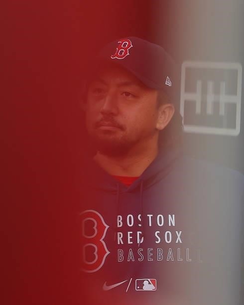 Hirokazu Sawamura of the Boston Red Sox walks in the dugout prior to facing the Atlanta Braves at Truist Park on June 16, 2021 in Atlanta, Georgia.