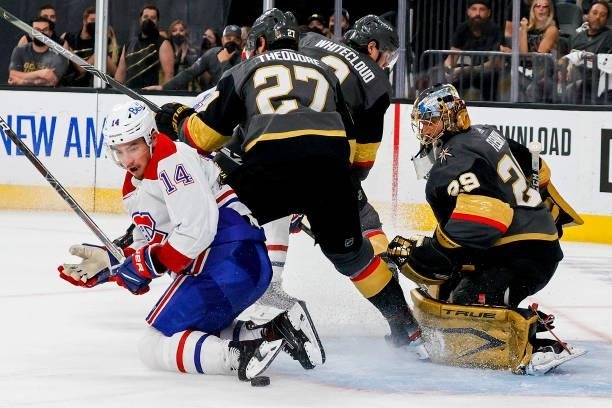 Marc-Andre Fleury of the Vegas Golden Knights makes the save against Nick Suzuki of the Montreal Canadiens during the third period in Game Two of the...