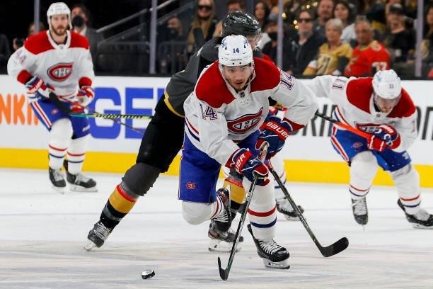 Nick Suzuki of the Montreal Canadiens carries the puck against the Vegas Golden Knights during the third period in Game Two of the Stanley Cup...