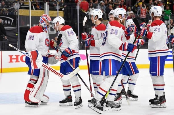The Montreal Canadiens celebrate after defeating the Vegas Golden Knights in Game Two of the Stanley Cup Semifinals at T-Mobile Arena on June 16,...