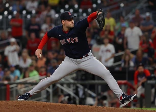 Adam Ottavino of the Boston Red Sox pitches in the ninth inning against the Atlanta Braves at Truist Park on June 16, 2021 in Atlanta, Georgia.
