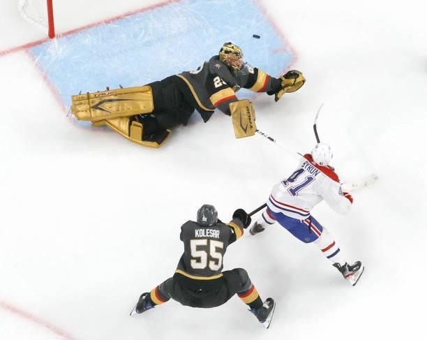 Paul Byron of the Montreal Canadiens scores a second-period goal against Marc-Andre Fleury of the Vegas Golden Knights as Keegan Kolesar of the...