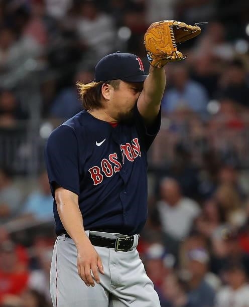 Hirokazu Sawamura of the Boston Red Sox reacts after being pulled in the sixth inning against the Atlanta Braves at Truist Park on June 16, 2021 in...