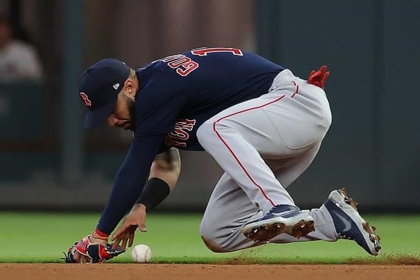 Marwin Gonzalez of the Boston Red Sox bobbles a ground out by Ender Inciarte of the Atlanta Braves in the fourth inning at Truist Park on June 16,...