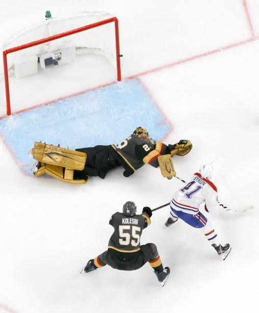 Paul Byron of the Montreal Canadiens scores a second-period goal against Marc-Andre Fleury of the Vegas Golden Knights as Keegan Kolesar of the...