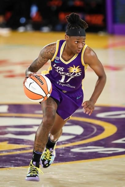 Erica Wheeler of the Los Angeles Sparks controls the ball against the Phoenix Mercury in the final minute of the game at Los Angeles Convention...
