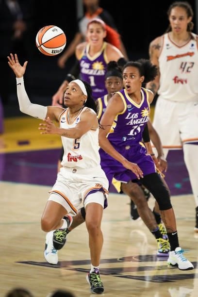 Shey Peddy of the Phoenix Mercury controls the ball in the second half against the Los Angeles Sparks at Los Angeles Convention Center on June 16,...