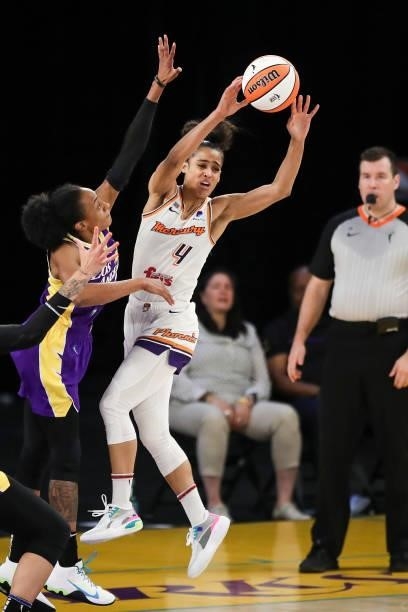 Skylar Diggins-Smith of the Phoenix Mercury passes the ball against Brittney Sykes of the Los Angeles Sparks at Los Angeles Convention Center on June...