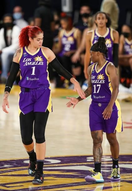 Amanda Zahui B and Erica Wheeler of the Los Angeles Sparks celebrate a play during the second half against the Phoenix Mercury at Los Angeles...