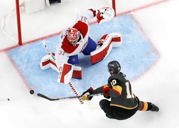 Nicolas Roy of the Vegas Golden Knights looks for a rebound as Carey Price of the Montreal Canadiens deflects a shot in the first period in Game Two...