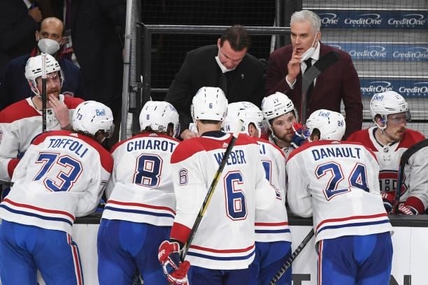 Head coach Dominique Ducharme of the Montreal Canadiens talks to his players during a break in the third period in Game Two of the Stanley Cup...