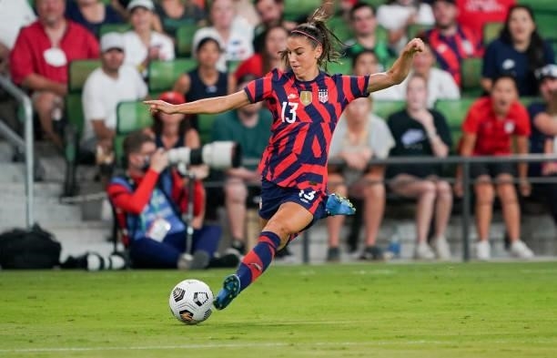 Alex Morgan of the United States crosses the ball against Nigeria during a WNT Summer Series game at Q2 Stadium on June 16, 2021 in Austin, Texas.