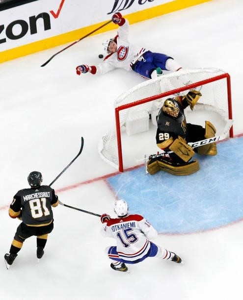 Josh Anderson of the Montreal Canadiens careens off the net after he lost the puck while trying to get a shot off against Marc-Andre Fleury of the...
