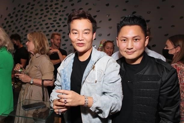 Kane Lim poses with Jeweler Kyle Chan wearing custom made diamond ring at Kyle Chan's Retail Store Opening at Kyle Chan Design on June 16, 2021 in...