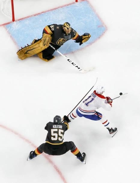 Paul Byron of the Montreal Canadiens closes in on Marc-Andre Fleury of the Vegas Golden Knights to score a second-period goal as Keegan Kolesar of...