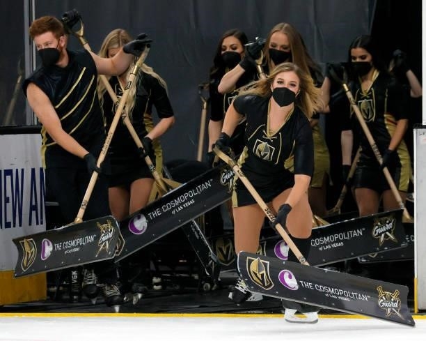 Members of the Knights Guard clean the ice during Game Two of the Stanley Cup Semifinals during the 2021 Stanley Cup Playoffs between the Montreal...
