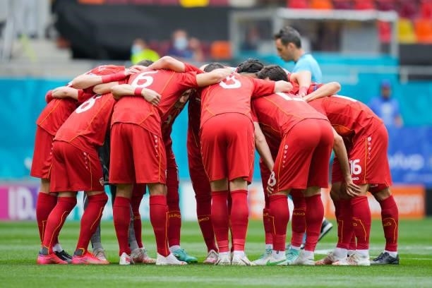 Players of North Macedonia form a huddle prior to the UEFA Euro 2020 Championship Group C match between Ukraine and North Macedonia at National Arena...