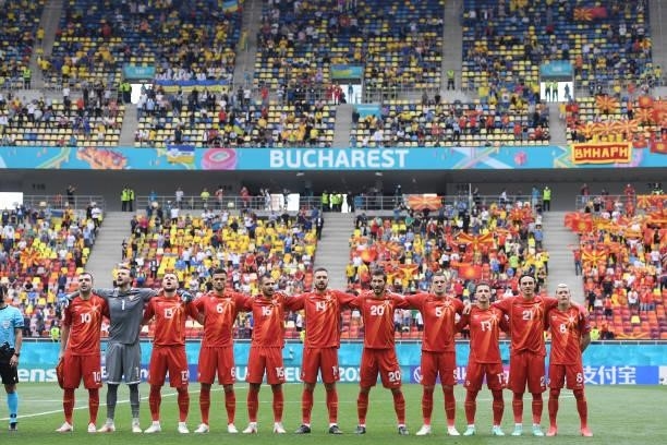 North Macedonia players stand for the national anthem prior to the UEFA Euro 2020 Championship Group C match between Ukraine and North Macedonia at...