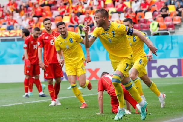 Andriy Yarmolenko of Ukraine celebrates after scoring their side's first goal during the UEFA Euro 2020 Championship Group C match between Ukraine...